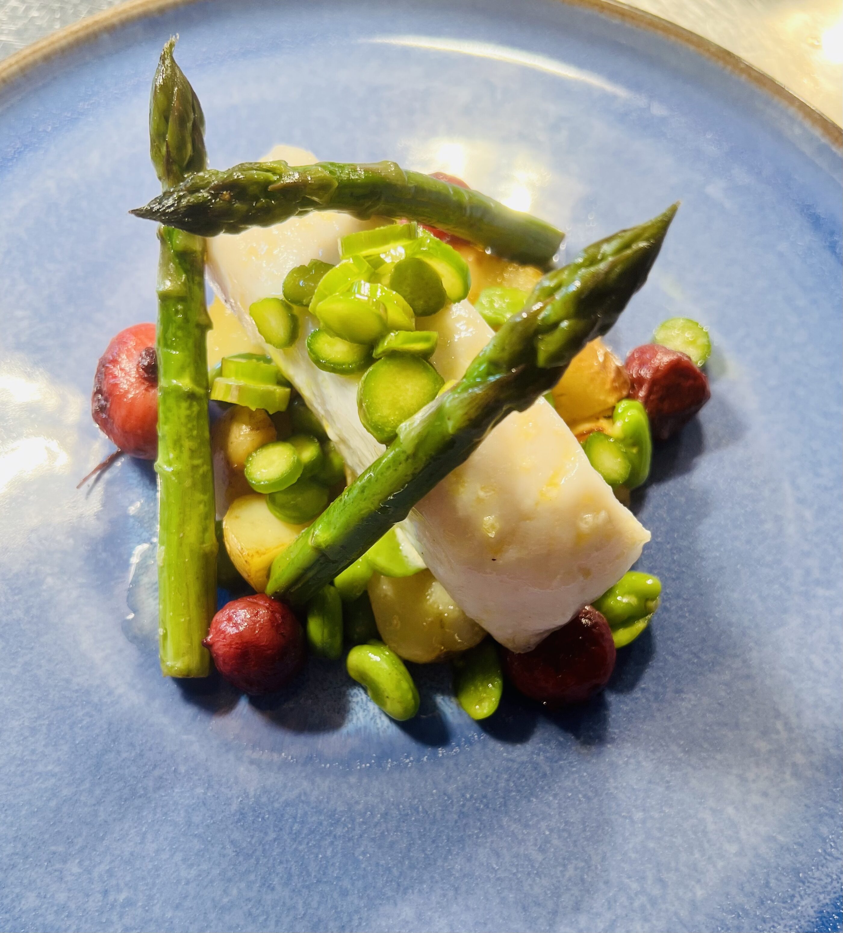 Halibut asparagus radish and broad beans